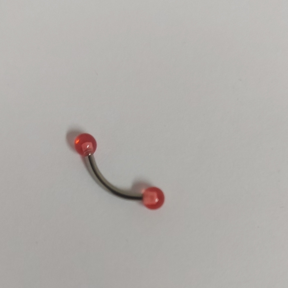Red Curved Barbell Piercing